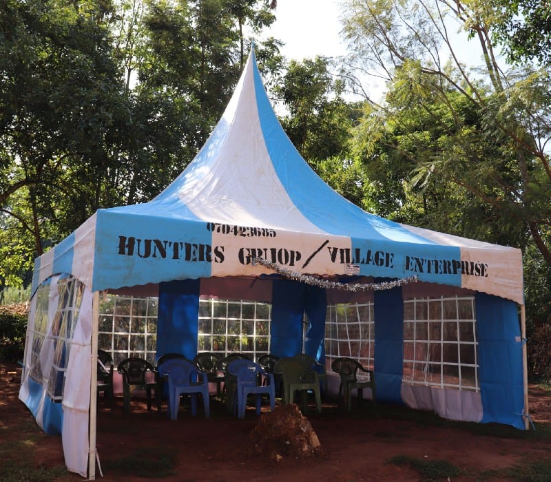 Village Enterprise small tent and chairs