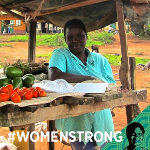 African woman with the text "#womenstrong" overlaid