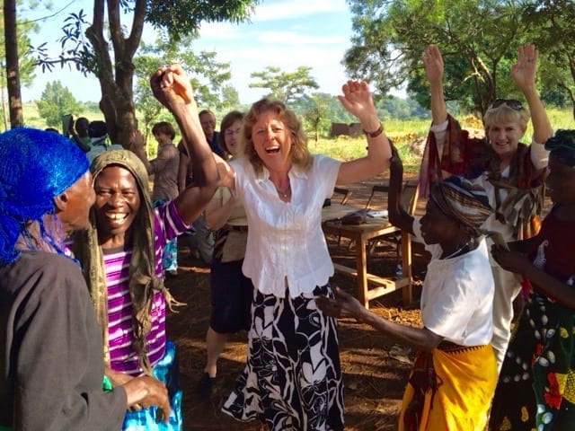 Christine Rose celebrating with Ugandan female business owners