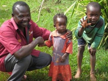 Jonah Isindu, Kenyan business owner, and his children