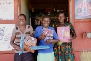 Village Enterprise young female entrepreneurs and their store