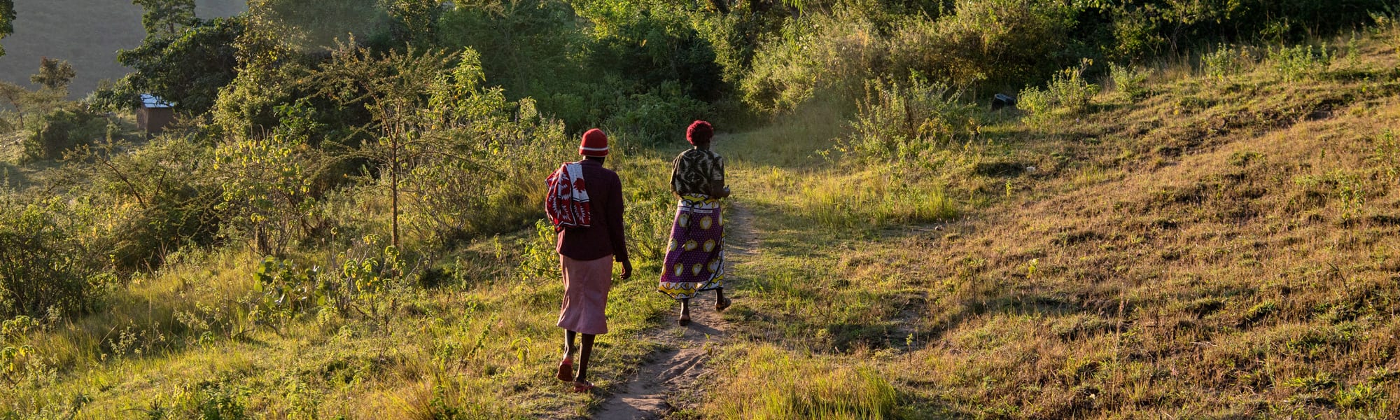 Women walking on path