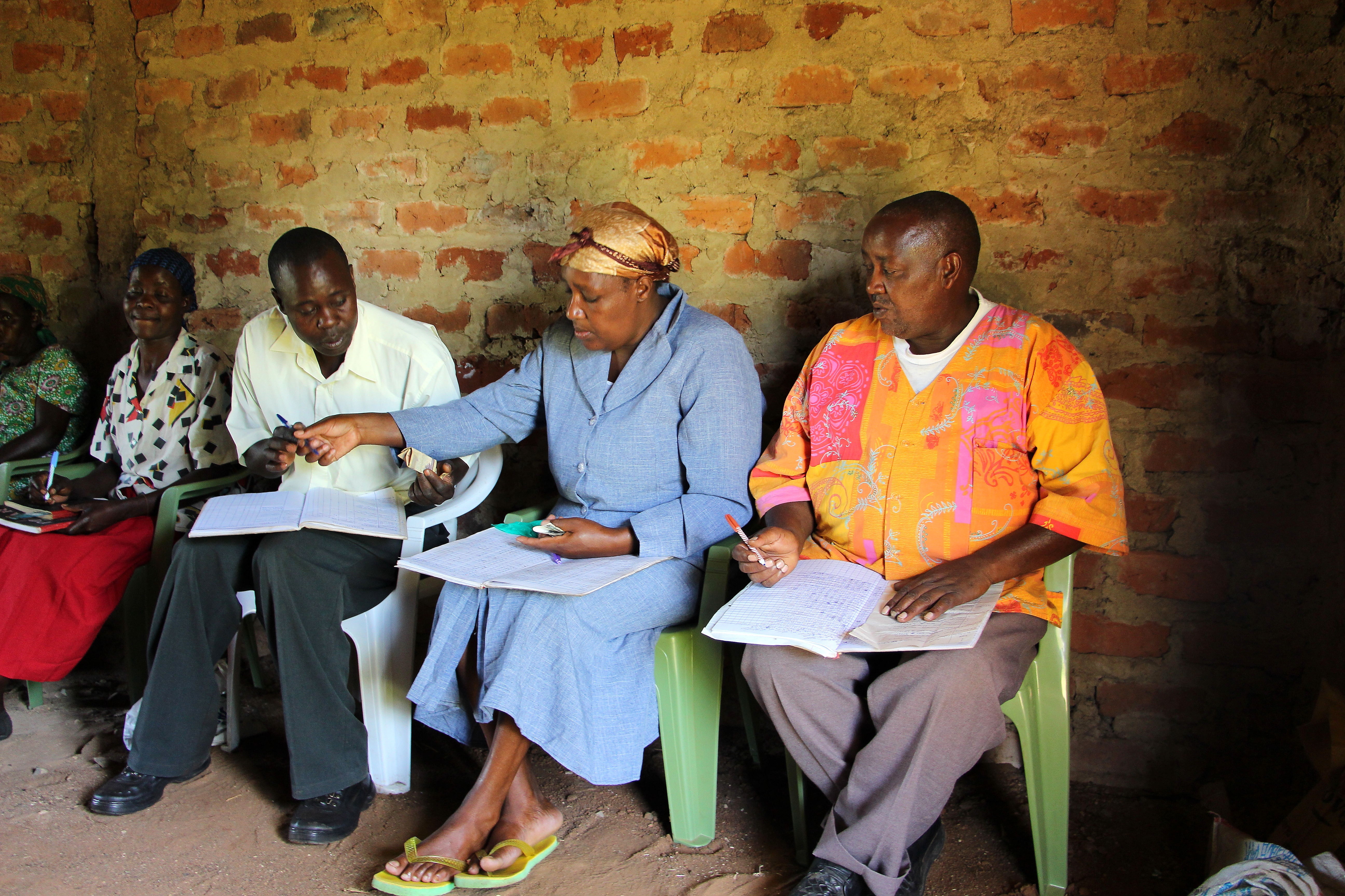 David Wafula, Hellen Mureithi, and Zablon Migwe writing