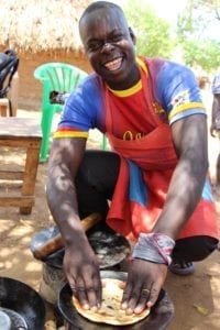 Business owner Julius making chapati