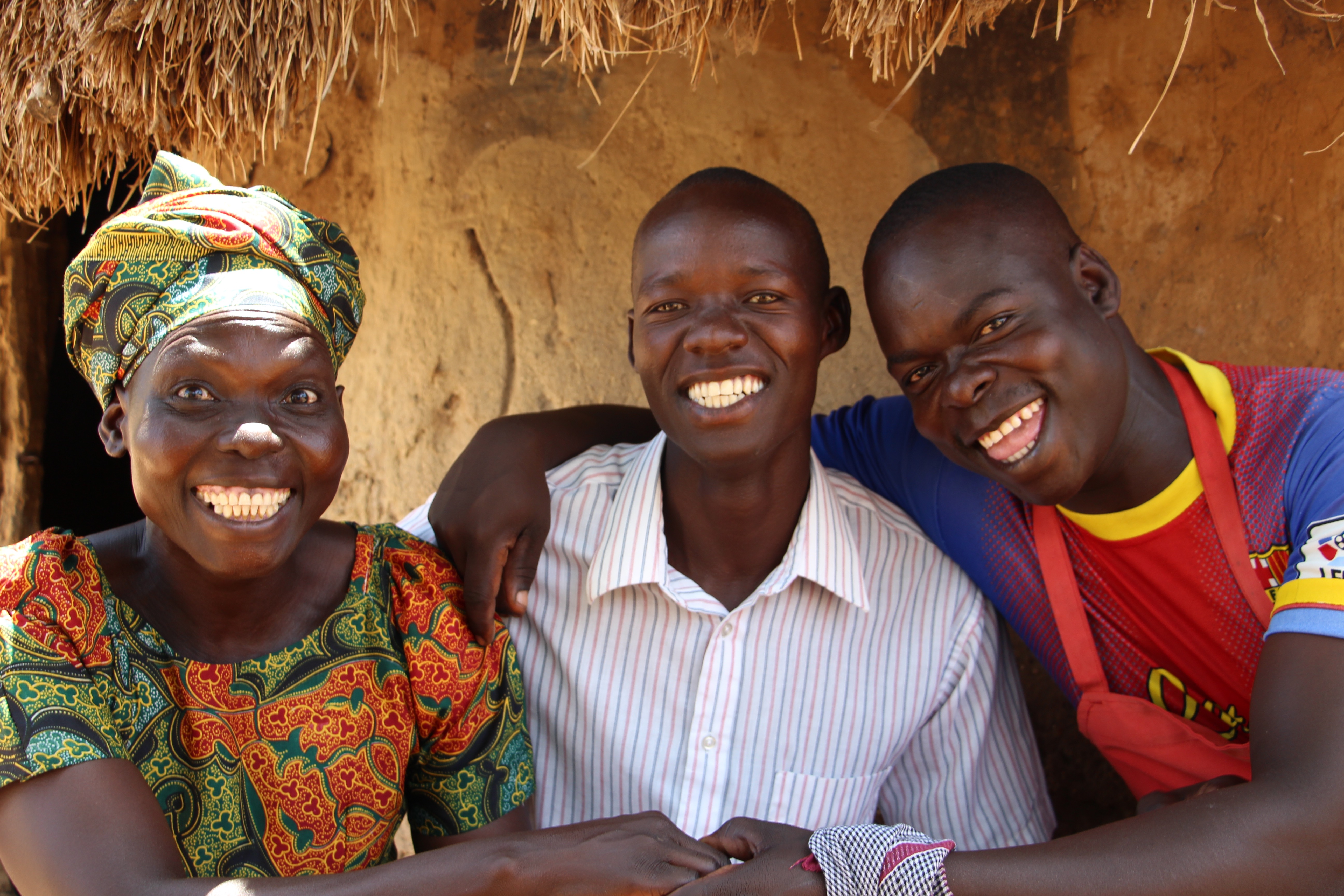 Village Enterprise business owners Anna, Stephen, and Julius