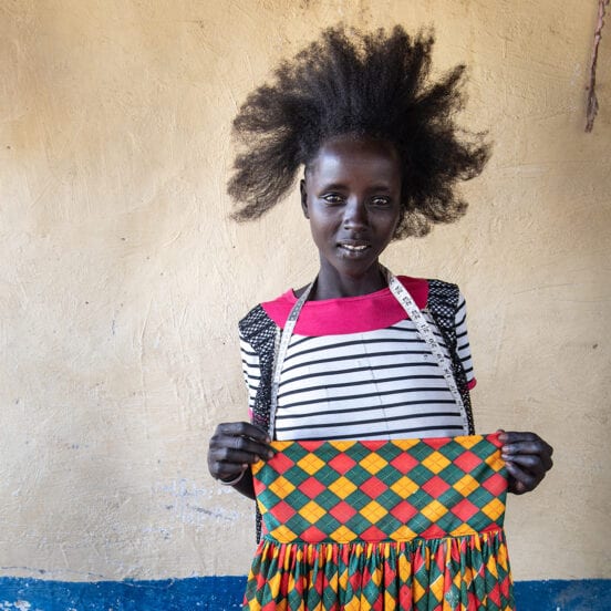 girl holding a dress