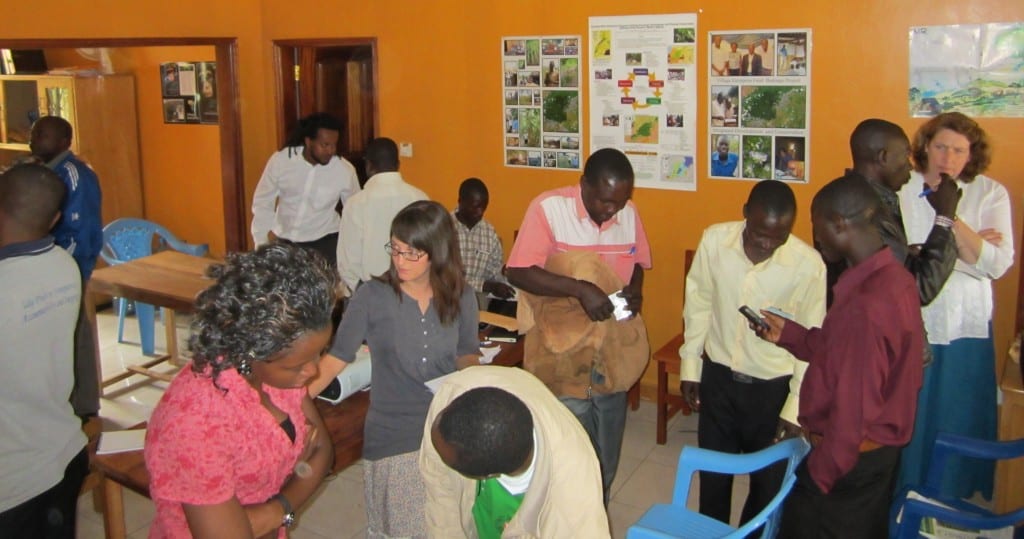 Village Enterprise Hoima, Uganda, staff talking